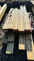 A PALLET CONTAINING APPROX 40 OFFCUT LENGTHS OF TANALISED DECKING WITH NON SLIP GRIP,