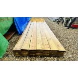 33 X 3.9M LENGTHS 145MM X 35MM PLANED TANALISED TIMBER. THIS LOT IS SUBJECT TO VAT ON HAMMER PRICE.