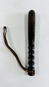 A VINTAGE MILITARY WAR DEPARTMENT TRUNCHEON WITH LEATHER STRAP L 31CM.