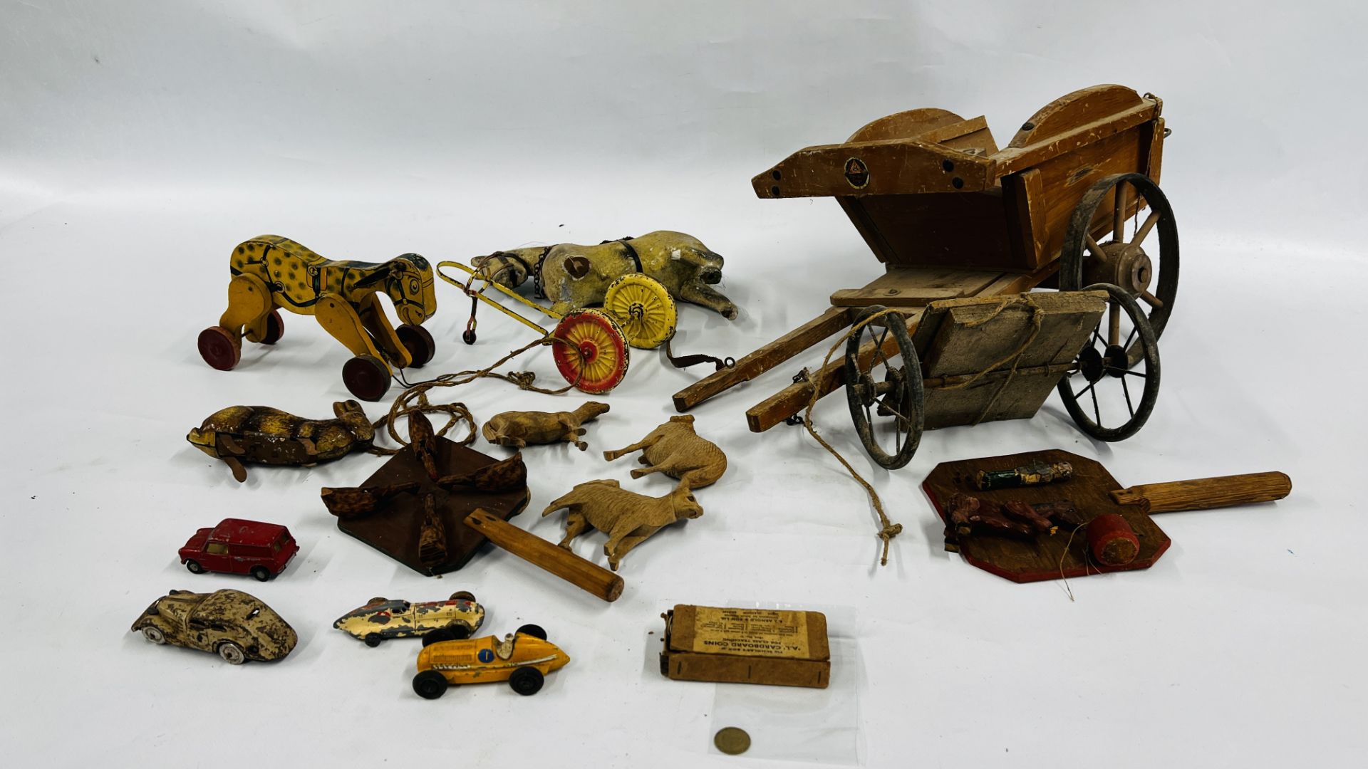 BOX CONTAINING VINTAGE TOYS INCLUDING WOODEN PULL-ALONG HORSE PATENT USA OCTOBER 1926,