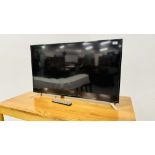 SHARP 42" FLAT SCREEN TV WITH REMOTE - SOLD AS SEEN.