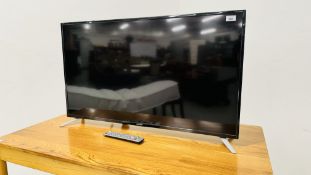 SHARP 42" FLAT SCREEN TV WITH REMOTE - SOLD AS SEEN.