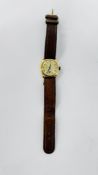 A VINTAGE 9CT GOLD CASED WRIST WATCH MARKED HERBERT ....... LTD MAGNO LUX ON A BROWN LEATHER STRAP.