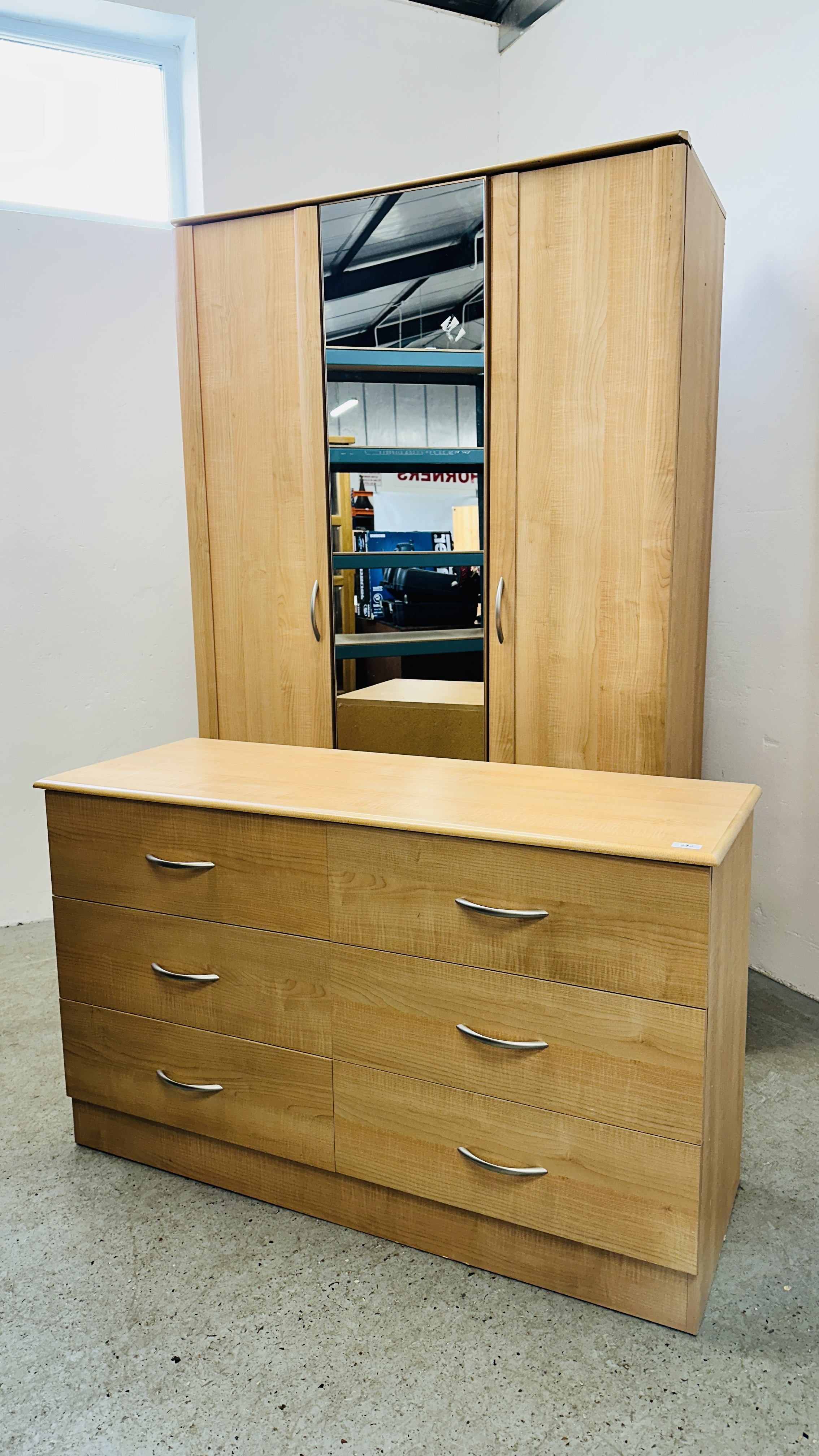 A MODERN 6 DRAWER BEECH FINISH CHEST W 122 X D 45 X H 74CM.