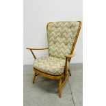 AN ERCOL WINDSOR TALL BACK EASY CHAIR.