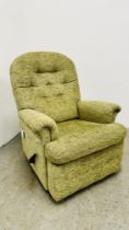 A GREEN UPHOLSTERED RECLINING EASY CHAIR.