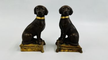 A PAIR OF RESIN DOGS SAT ON CUSHIONS 1 A/F 19CM H.