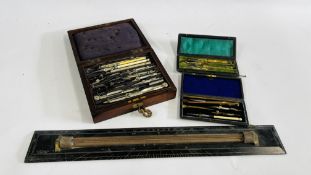 AN ANTIQUE TECHNICAL DRAWING INSTRUMENT SET CASED IN A ROSEWOOD BOX WITH KEY (NOT GUARANTEED