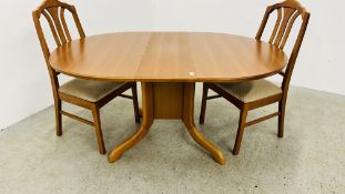 A MAHOGANY FINISH DROP FLAP KITCHEN TABLE AND 2 CHAIRS.