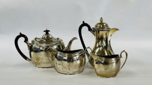A SILVER THREE PIECE TEASET, ENGRAVED WITH CREST,