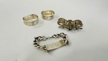 TWO SILVER NAPKIN RINGS, BIRMINGHAM ASSAY ALONG WITH A VINTAGE SILVER BELT BUCKLE,