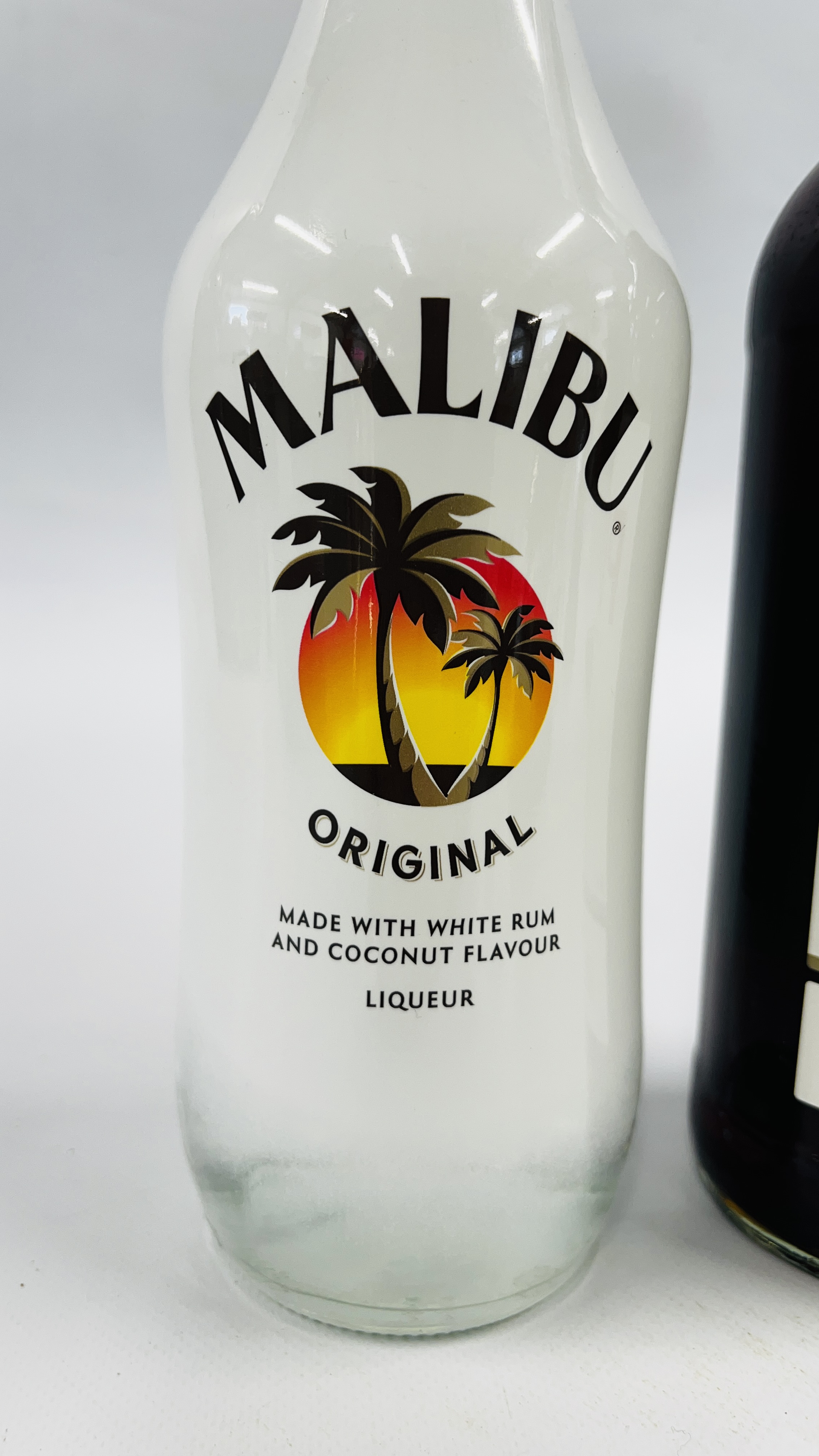 1 X 1 LITRE MALIBU COCONUT & WHITE RUM LIQUEUR PLUS 1 X 1 LITRE PIMMS NO.1. - Image 4 of 4