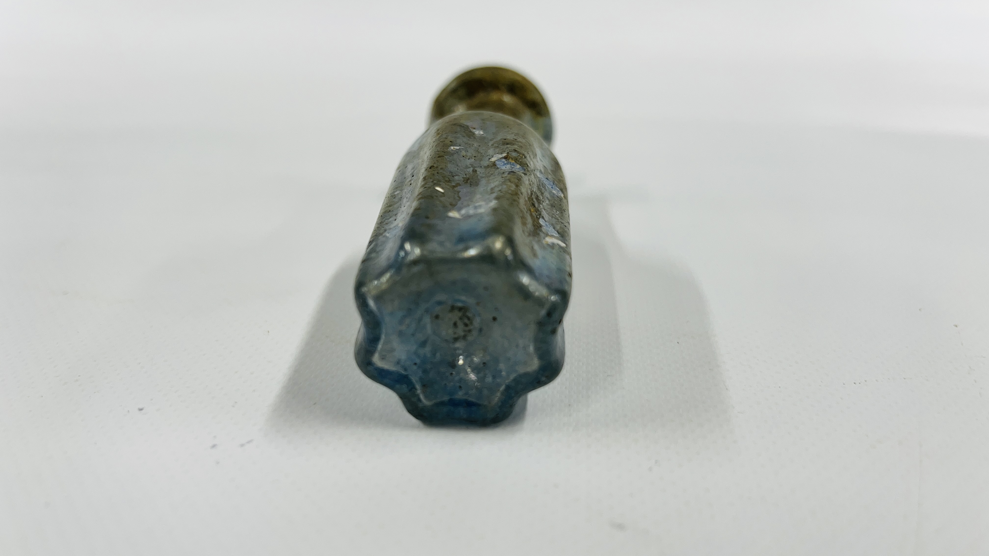 A VINTAGE ROMAN STYLE BOTTLE MOULDED FROM PALE BLUE TRANSLUCENT GLASS A/F H 13CM. - Image 5 of 5