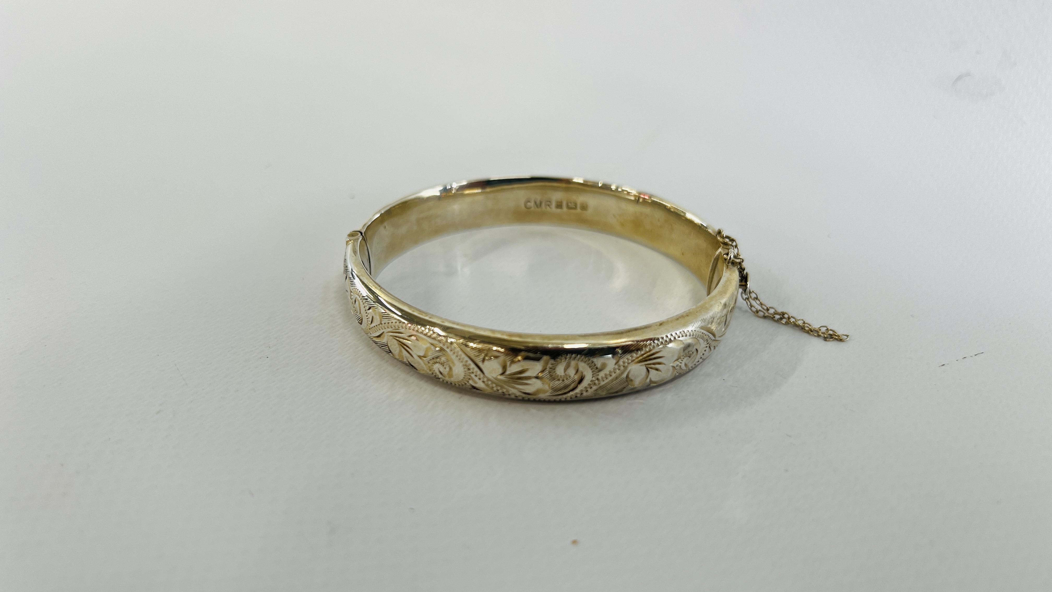 TWO SILVER ENGRAVED HINGED BANGLES BOTH HAVING SAFETY CHAINS. - Image 7 of 11