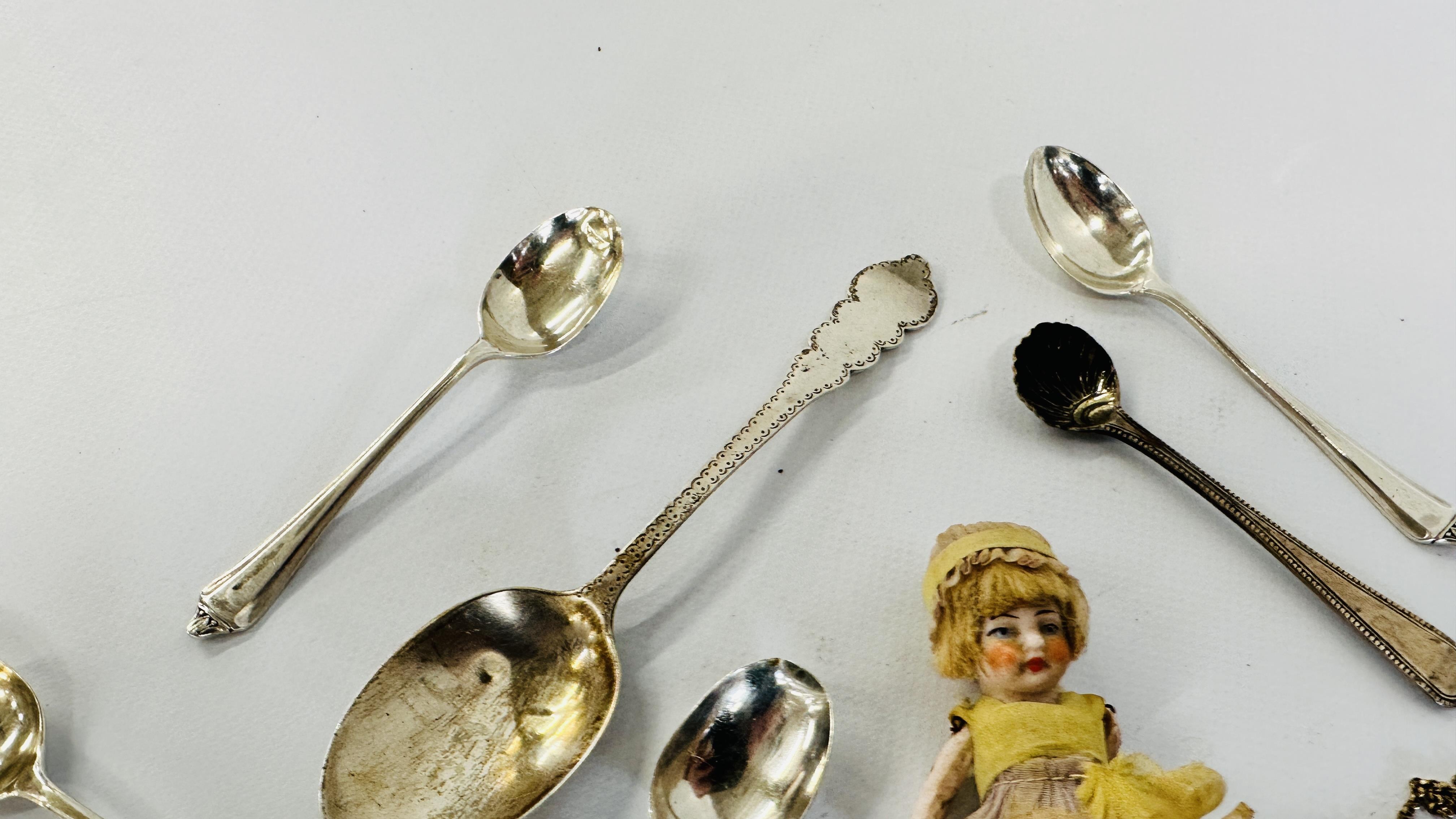 A GROUP OF 8 ASSORTED SILVER SPOONS, GILT SPIDER BROOCH ETC. AND A VINTAGE BISQUE MINIATURE DOLL. - Image 6 of 8