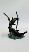 A COPPER FIGURE OF 2 DOLPHINS H 20CM.
