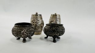 A PAIR OF INDIAN WHITE METAL PEPPER OF BARREL FORM AND A PAIR OF NON RELATED SALTS.