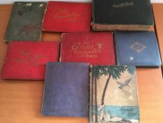 CIGARETTE CARDS: BOX WITH EIGHT OLDER STYLE CORNER SLOT ALBUMS WITH SETS, PART SETS, ETC.