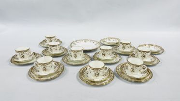 A VINTAGE 36 PIECE SHELLEY TEA SET, DECORATED WITH GILT SWAGS AND HAND PAINTED ROSES.