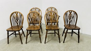 A SET OF SIX WHEEL BACK DINING CHAIRS (4 SIDE,