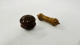 A VINTAGE CARVED COQUILLA NUT POMANDER + A FURTHER RESIN EXAMPLE.