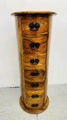 A HARDWOOD 7 DRAWER CYLINDRICAL TOWER CHEST - HEIGHT 104CM.