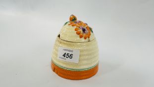 A CLARICE CLIFF BIZARRE HONEY POT TITLED MARGUERITE - H 9.5CM.