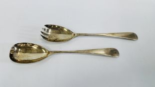 A PAIR OF SILVER SERVING SPOONS,