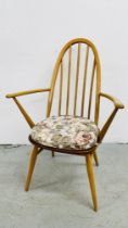 AN ERCOL WINDSOR QUAKER ARM CHAIR.