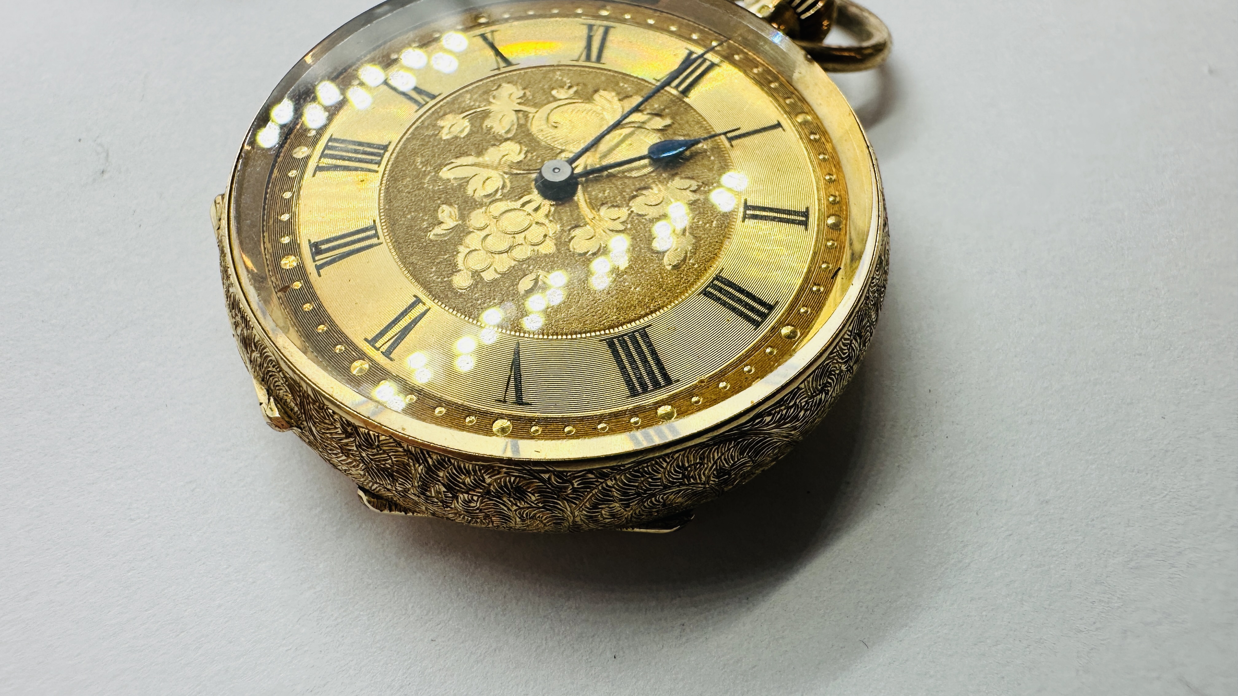 AN ELABORATE ANTIQUE 18CT GOLD CASED HALF HUNTER POCKET WATCH ALONG WITH A WOVEN WATCH CHAIN, - Image 14 of 17