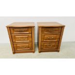 A PAIR OF GOOD QUALITY MODERN CHERRY WOOD FINISH THREE DRAWER BEDSIDE CHESTS EACH W 59CM D 51CM H