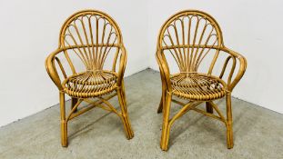 A PAIR OF WICKER ARMCHAIRS.