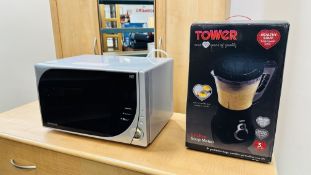 A TESCO MANUAL MICROWAVE (BOXED) ALONG WITH A TOWER 1.5 LITRE SOUP MAKER (BOXED) - SOLD AS SEEN.