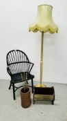 AN ANTIQUE BLACK FINISHED STICK BACK SMOKER'S CHAIR ALONG WITH A VINTAGE REEDED STANDARD LAMP (WIRE