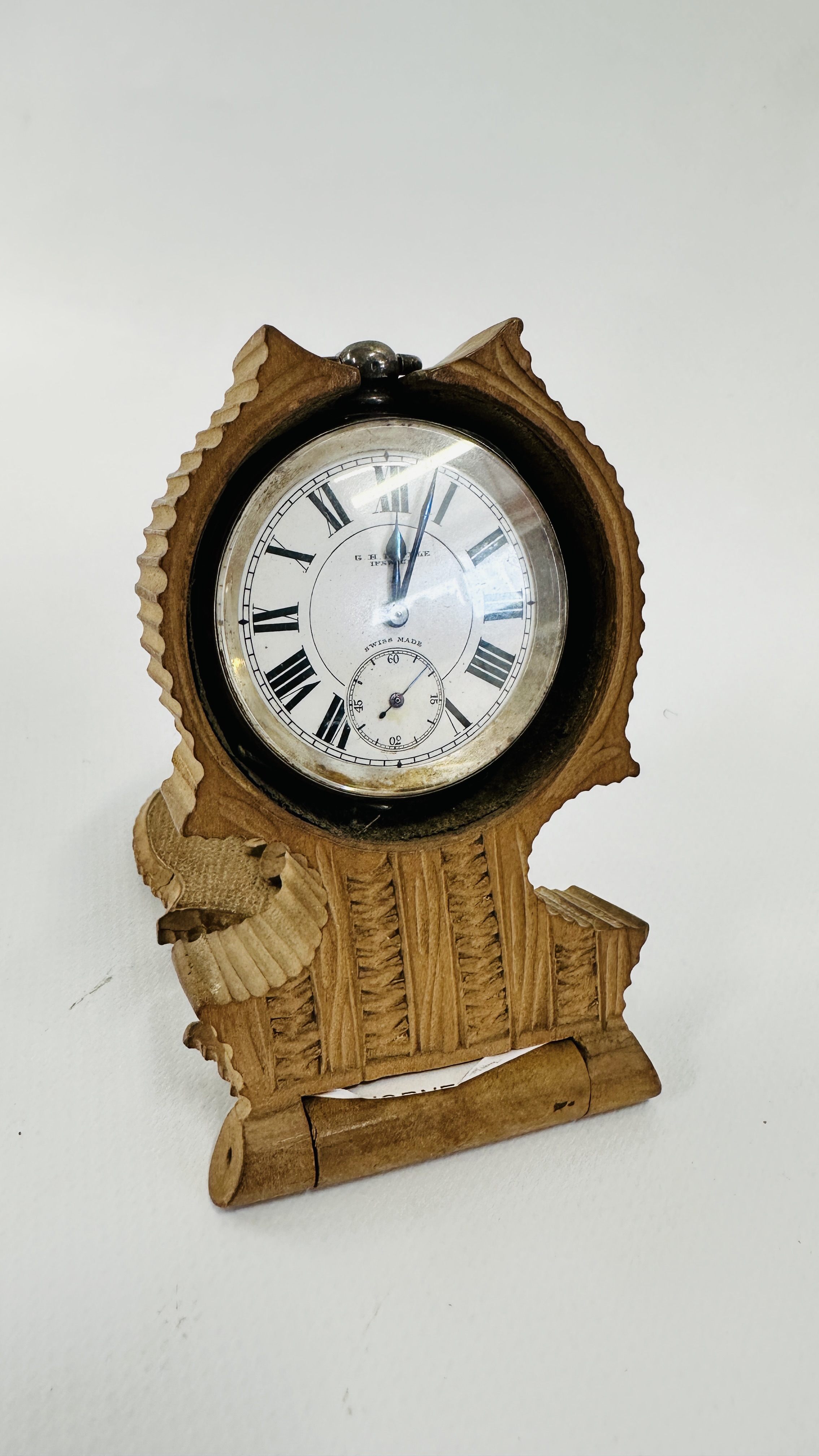 ANTIQUE G. H DIPPLE IPSWICH POCKET WATCH IN ANTIQUE CARVED WOOD BED STAND.