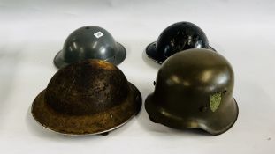 A GROUP OF FOUR MILITARY HELMETS TO INCLUDE WW2 GERMAN WITH LINER,