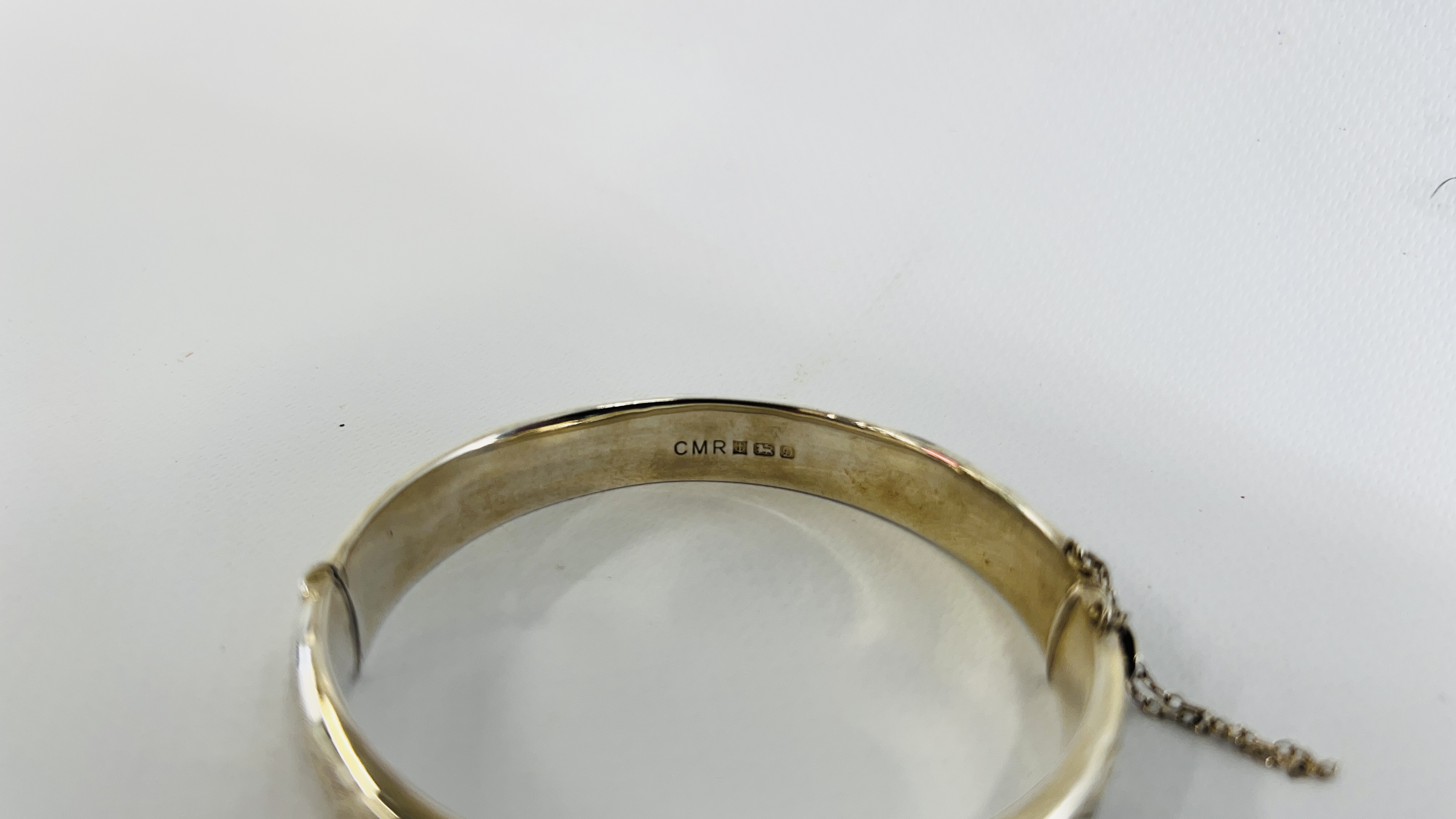 TWO SILVER ENGRAVED HINGED BANGLES BOTH HAVING SAFETY CHAINS. - Image 8 of 11