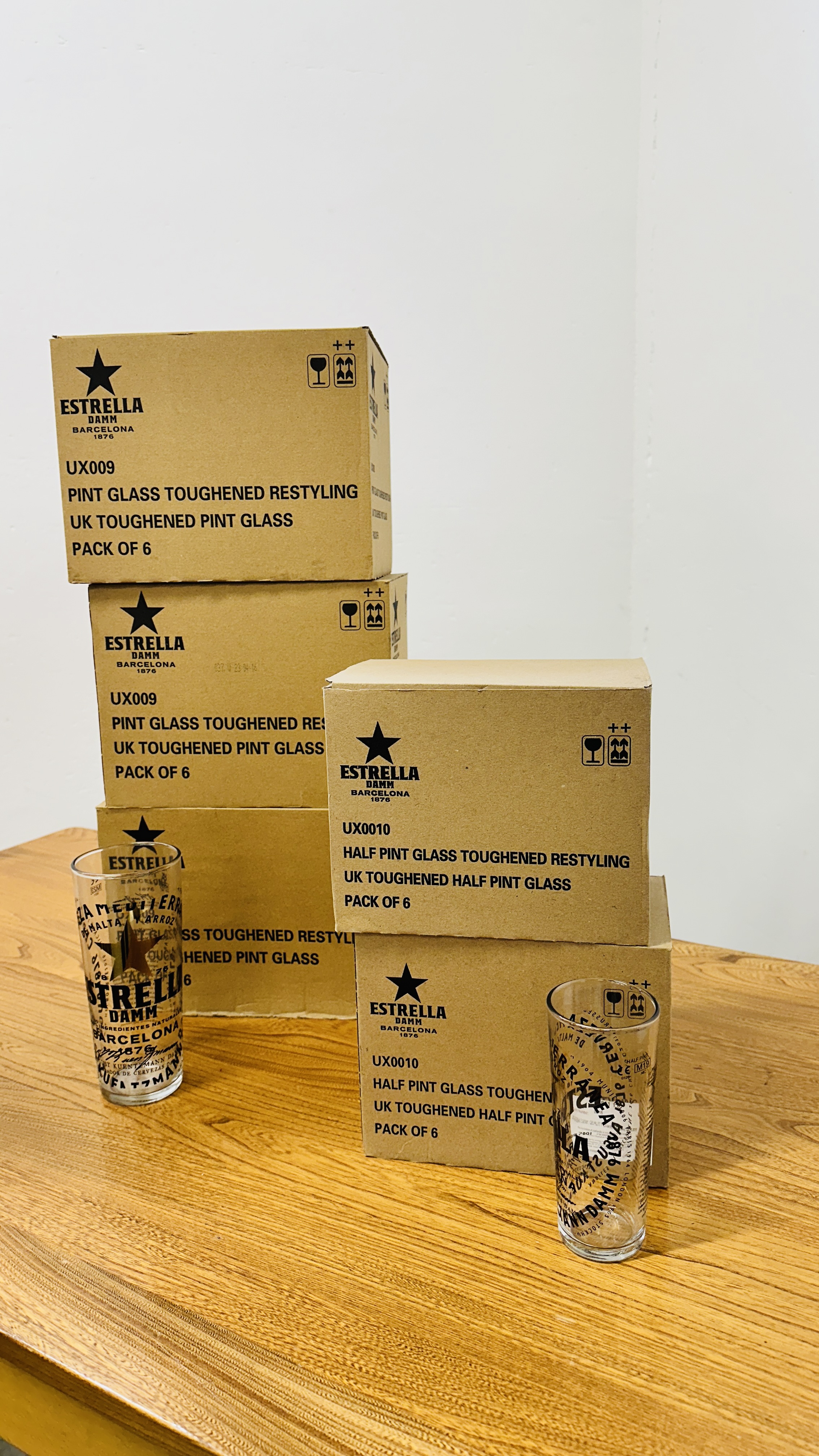 18 X ESTRELLA PINT PROMOTIONAL GLASSES PLUS 12 ESTRELLA ½PINT PROMOTIONAL GLASSES.