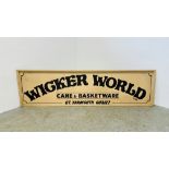 A WOODEN ADVERTISING SIGN "WICKER WORLD" - LENGTH 227CM HEIGHT 63CMM.