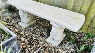 A STONEWORK GARDEN SEAT, THE BENCH SUPPORTED BY SQUIRRELS, LENGTH 110CM.