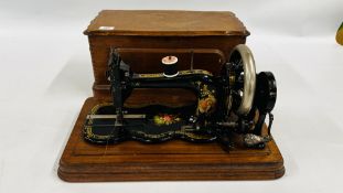 A VINTAGE BRADBURY HAND SEWING MACHINE IN CASE.