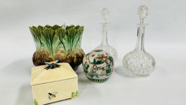 A PAIR OF VINTAGE GLASS DECANTERS ALONG WITH A MAJOLICA STYLE JARDINIERE,