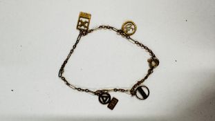A 9CT GOLD CHARM BRACELET (REPLACEMENT CLASP GOLD PLATED).