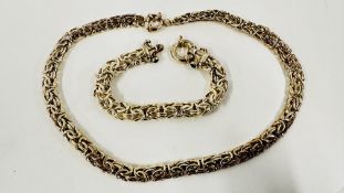 AN ITALIAN DESIGNER WOVEN SILVER MATCHING NECKLACE AND BRACELET SET.