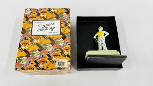 A WEDGEWOOD CLARICE CLIFF BIZARRE LIDO LADY IN YELLOW AND GREEN RETAINING ORIGINAL BOX.