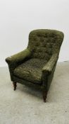EDWARDIAN BUTTON BACK EASY CHAIR UPHOLSTERED IN GREEN BROCADE MATERIAL.