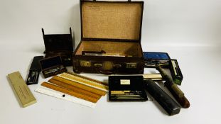 A VINTAGE BROWN LEATHER CASE CONTAINING A LARGE QUANTITY OF VINTAGE DRAWING INSTRUMENTS AND