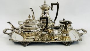 A VINTAGE 4 PIECE SILVER PLATED TEA SET AND AN IMPRESSIVE TWO HANDLED TRAY OF SHELL DESIGN MARKED H.