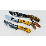 A GROUP OF THREE DECORATIVE KNIVES WITH HORN STYLE HANDLES THE BLADES DEPICTING WAVES AND EAGLES -