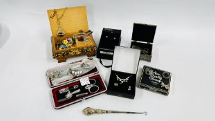 A BOX OF DRESSING ACCESSORIES INCLUDING SILVER ITEMS.